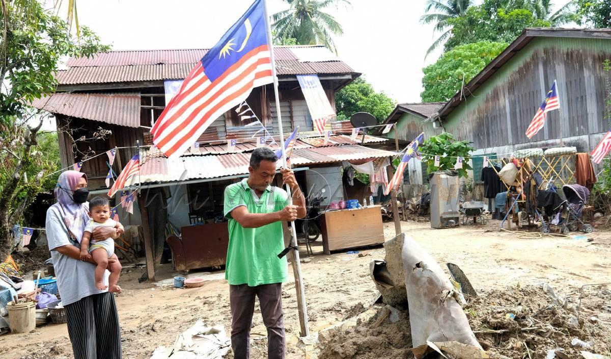 Berkibar dalam lumpur