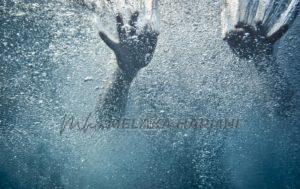 Hands underwater