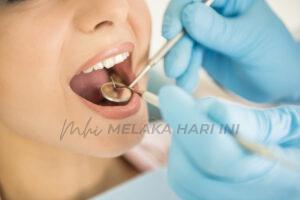 Close-up of woman having dental examination