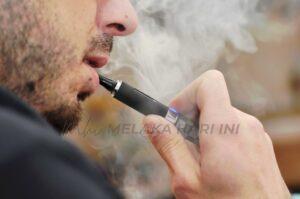 A man vaping and wondering if its bad for you