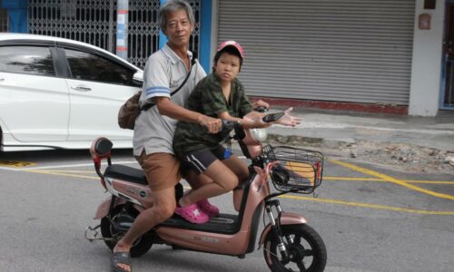 Kasih Hock Teng demi anak angkat OKU